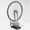 Wheel truing stand tilting base